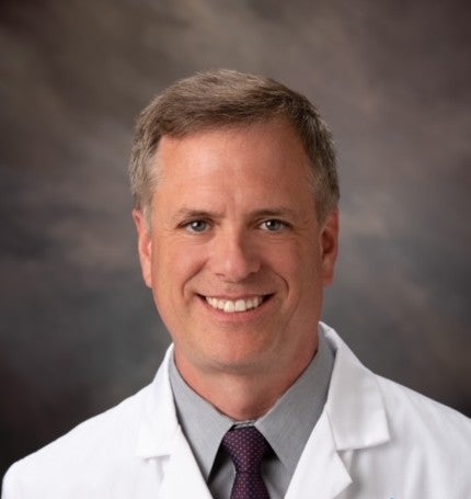 David M Woodbury, MD